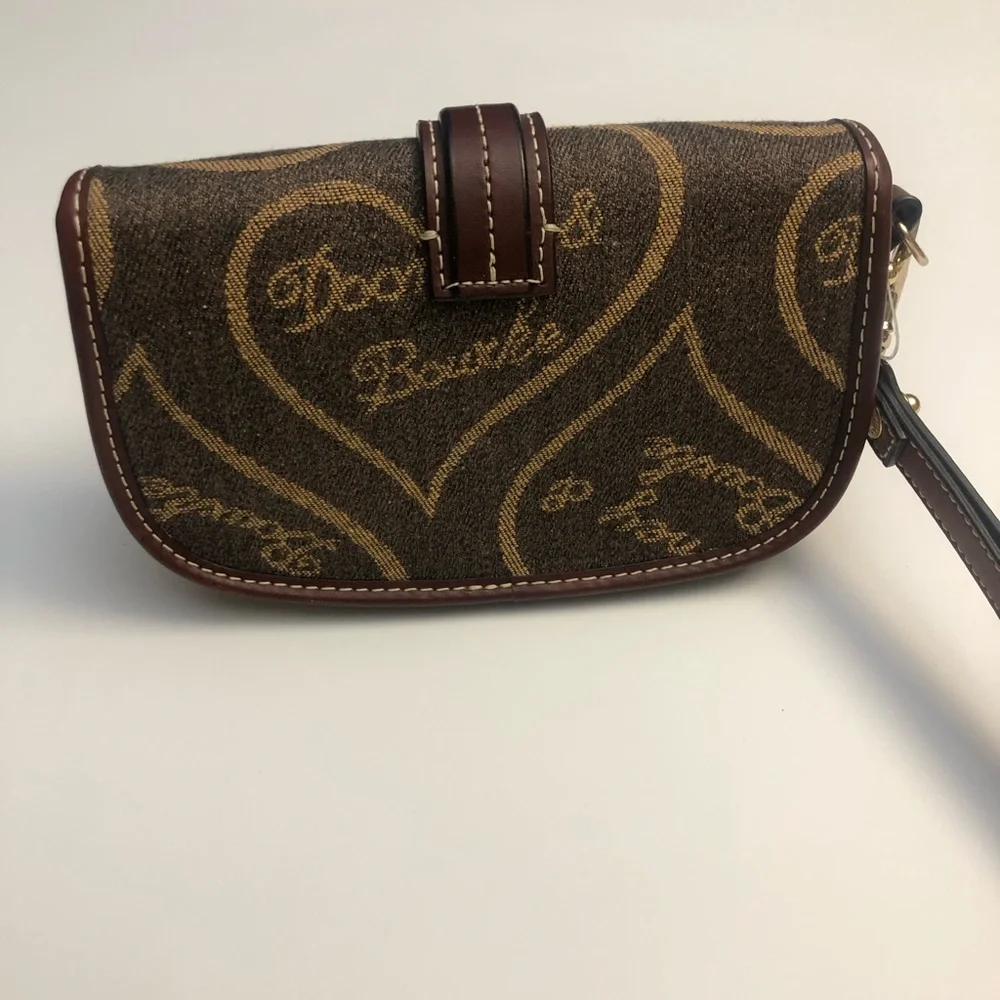 Dooney & Bourke vintage flap wristlet